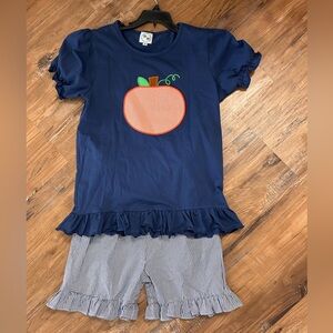 Pumpkin Smock Monkey shirt and navy gingham shorts size 10